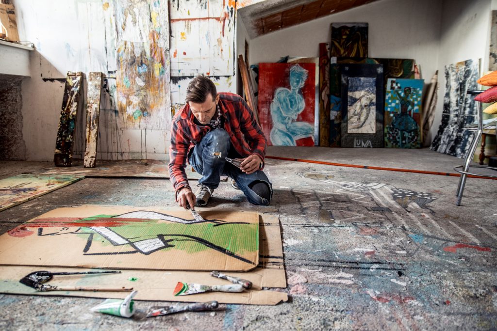 Artist Painting Canvas Cardboard On Floor