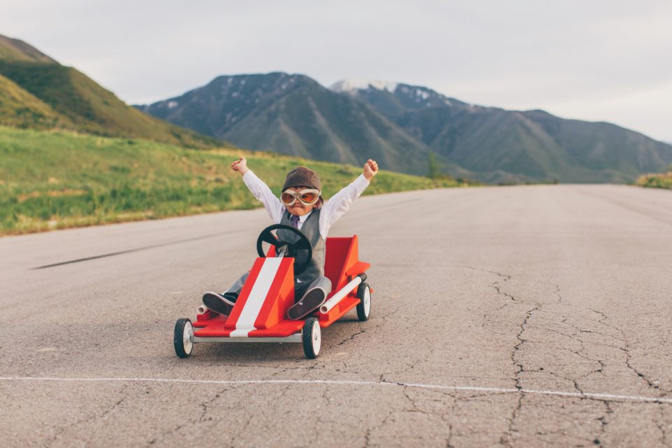 Young Business Boy Wins Go Cart Race