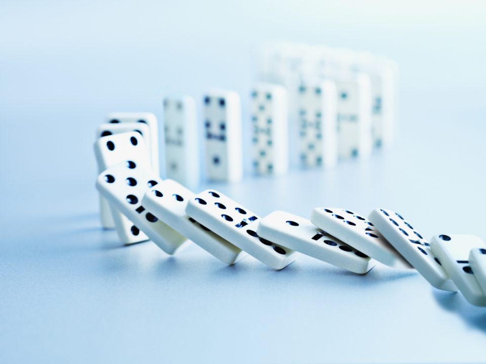 Knocking Down Dominoes